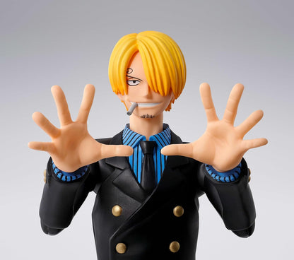 Figurine of a character with blonde hair and a black suit on a gray background One Piece: Sanji (Romance Dawn Ver.) Authentic S.H. Figuarts Fully Articulated Action Figure by Bandai Spirits