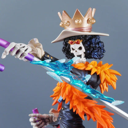 Action figure with a crown and colorful outfit against a gray background One Piece: "Soul King" Brook Deluxe 12.99-Inch Premium PVC Exhibition Scale Statue (Soul Solid Ice Blade Edition)