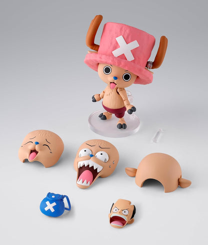 Action figure with interchangeable face parts on a gray background One Piece: Tony Tony Chopper (Drum Island Ver.) Authentic S.H. Figuarts Fully Articulated Action Figure by Bandai Spirits
