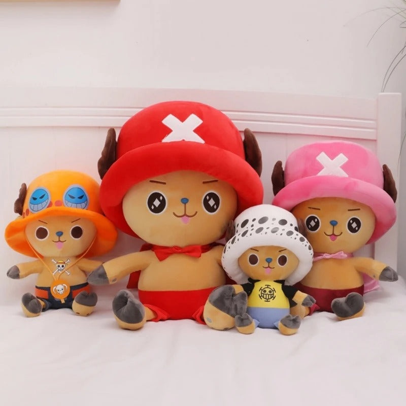Four colorful plush toys with unique hats on a white background One Piece: Tony Tony Chopper Luxury Character Plush
