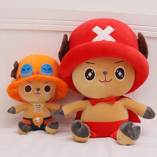 Two cartoon plush toys with distinctive hats on a white background One Piece: Tony Tony Chopper Luxury Character Plush 