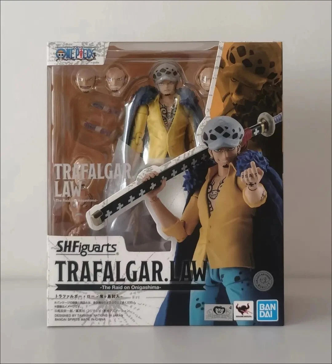 Action figure packaging of Trafalgar Law from Sh Figuarts series on a white background One Piece: Trafalgar Law (The Raid on Onigashima Ver.) Authentic S.H. Figuarts Fully Articulated Action Figure by Bandai Spirits