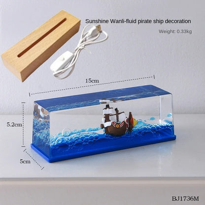 Pirate ship decoration with dimensions and weight information on a white background One Piece: Unsinkable Ship Liquid Drift Bottle – Thousand Sunny & Going Merry Premium Acrylic Desktop Motion Decor with Separate USB LED Illuminating Base
