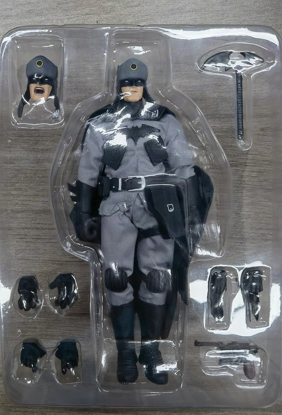 Action figure in packaging with accessories on a wooden surface Red Cold War Terminator (JM001) 1/12 Scale Collectible Action Figure by Joy Man Toys 1r