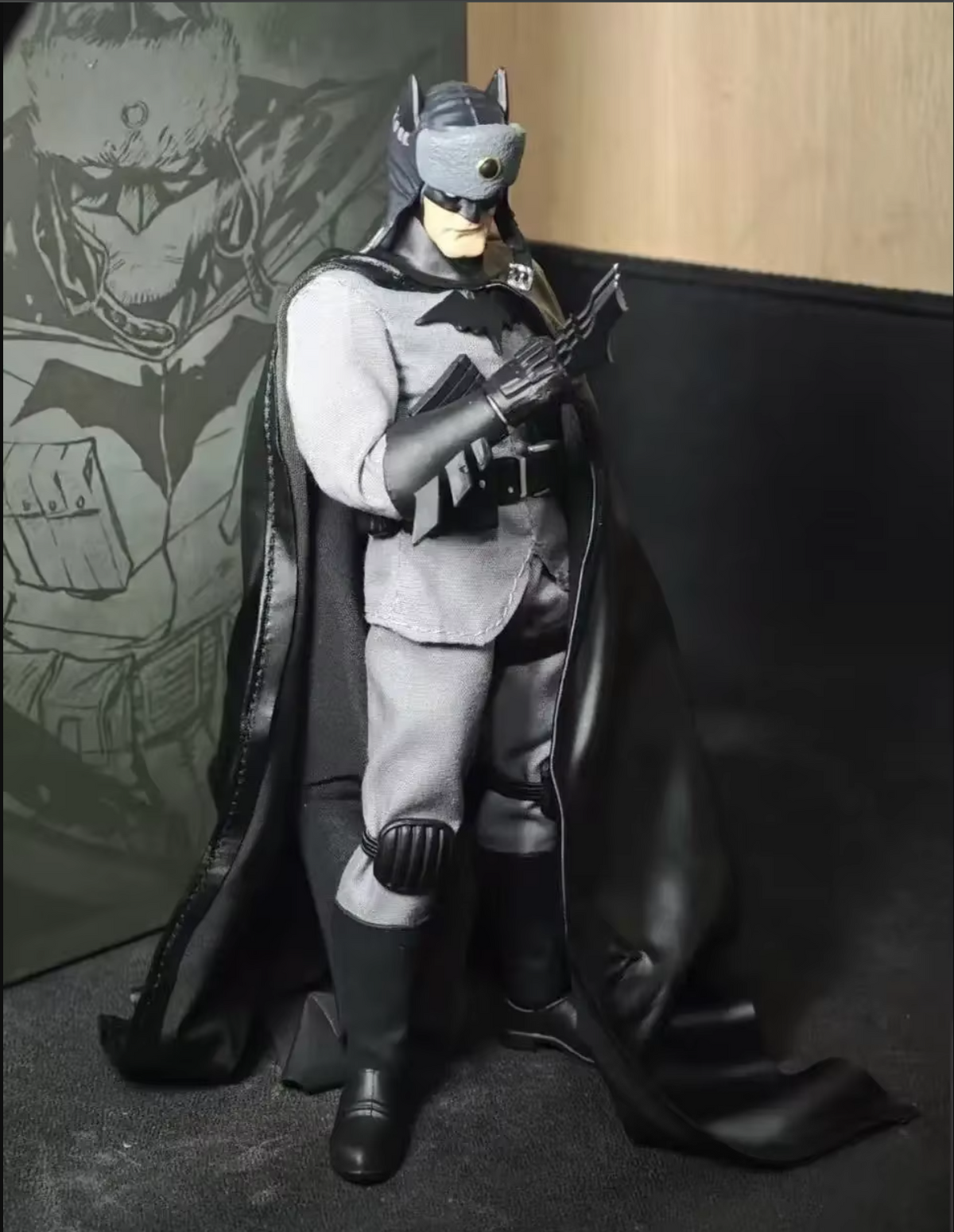 Batman action figure in a dark room with a light source Red Cold War Terminator (JM001) 1/12 Scale Collectible Action Figure by Joy Man Toys