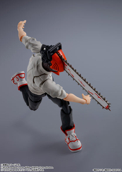 Action figure with a chainsaw on a gray background S.H.Figuarts Denji Authentic Action Figure – 5.9-Inch Human Form Fully Articulated Premium Collectible with Pochita Figure by Bandai Tamashii Nations fight