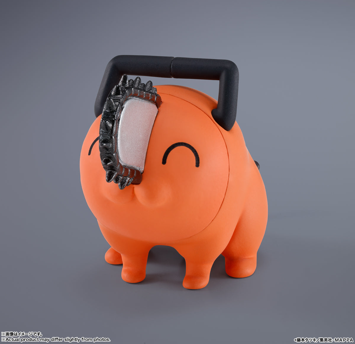 Orange dog object with a black handle on a gray background S.H.Figuarts Denji Authentic Action Figure – 5.9-Inch Human Form Fully Articulated Premium Collectible with Pochita Figure by Bandai Tamashii Nations pochita