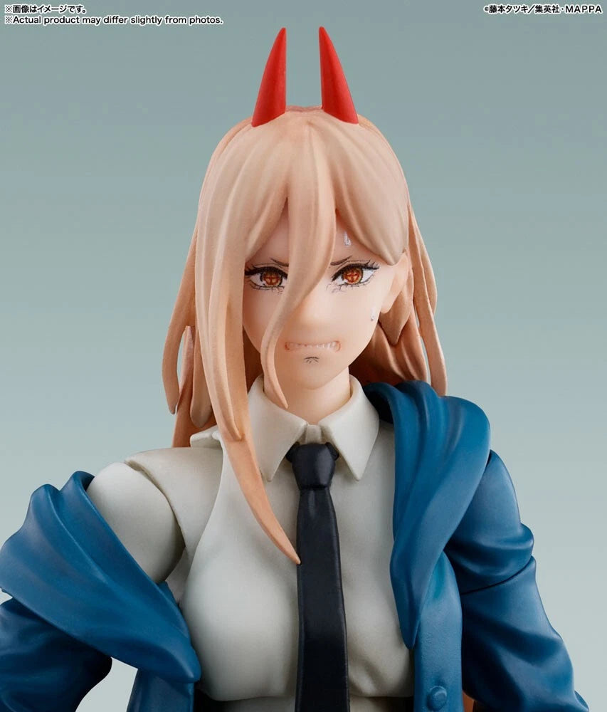 Figurine of a character with blonde hair and red horns, wearing a blue jacket and white shirt with a tie. S.H.Figuarts Power Authentic Action Figure – 5.7-Inch Blood Fiend Fully Articulated Premium Collectible with Meowy Figure upset
