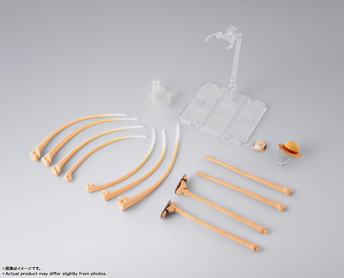 Set of plastic model parts on a gray background S.H. Figuarts One Piece: Monkey D. Luffy - Dawn of Adventures - Rubber Rubber Optional Parts Set by Bandai Spirits