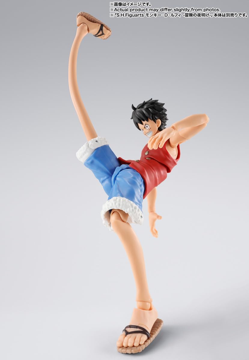 Action figure of a character in a dynamic pose on a gray background S.H. Figuarts One Piece: Monkey D. Luffy - Dawn of Adventures - Rubber Rubber Optional Parts Set by Bandai Spirits