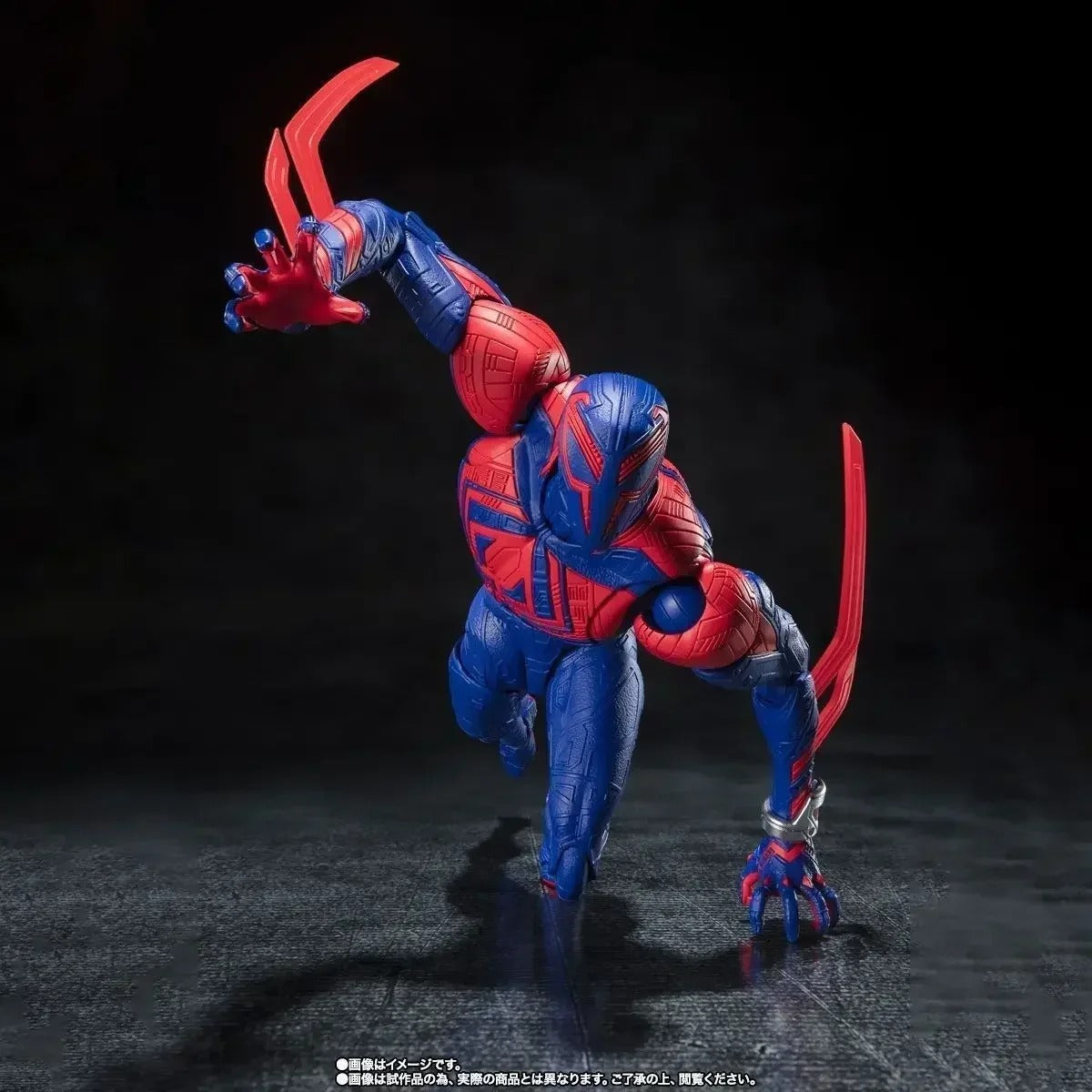 Action figure in red and blue costume with clawed hands on a dark background Spider-Man 2099 (Miguel O'Hara) Across The Spider-Verse 1/12 Scale Action Figure by CT Toys