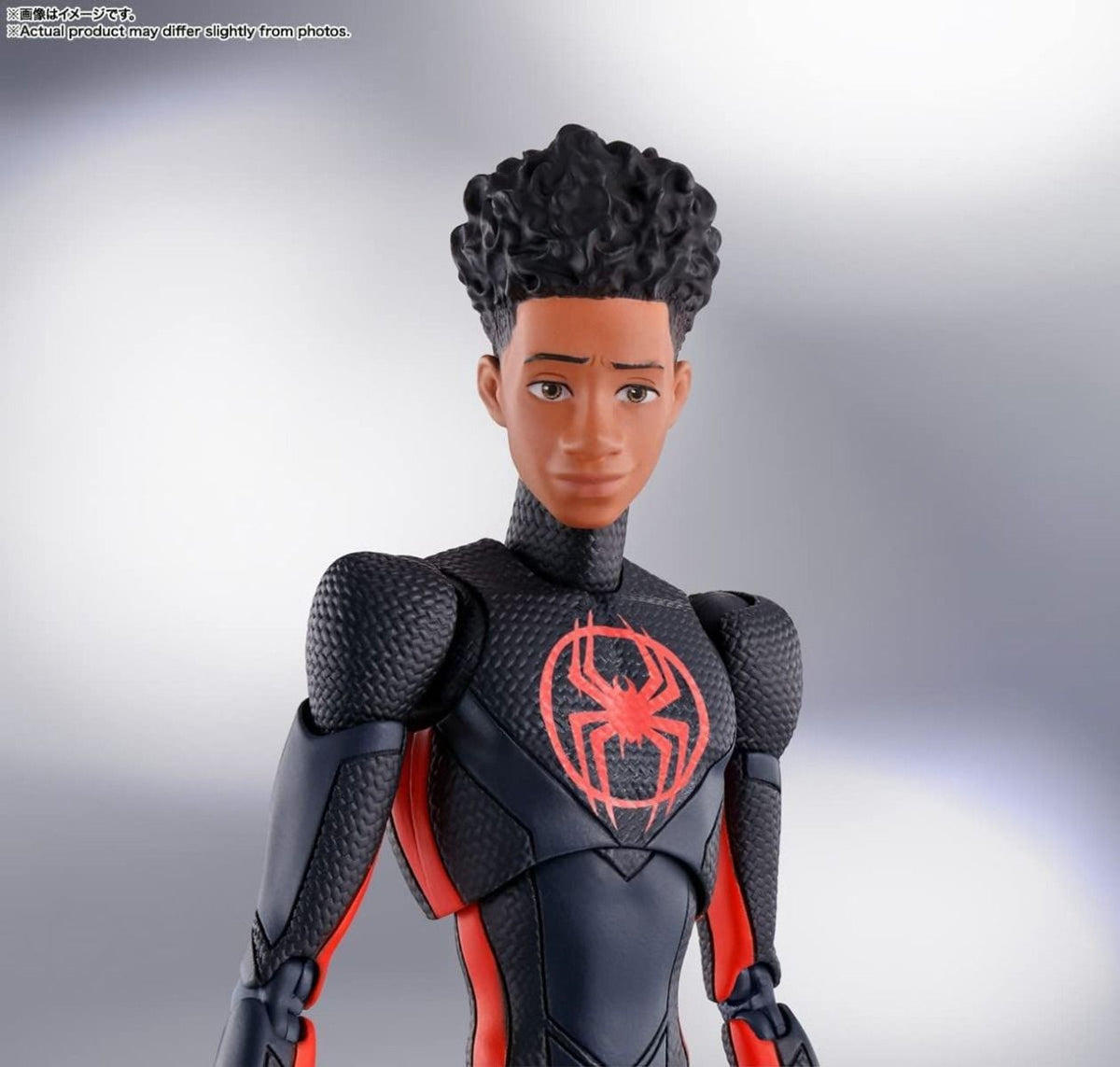 Action figure in a black and red superhero costume with a spider emblem on a gray background Spider-Man: Across The Spider-Verse 1/12 Scale Collectible Action Figures by CT.Toys