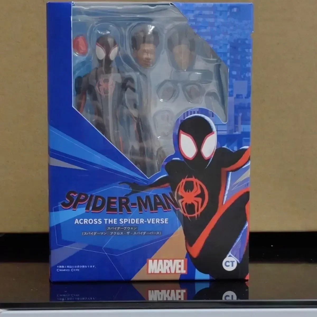 Spider-Man action figure packaging with blue and red design on a beige background Spider-Man: Across The Spider-Verse 1/12 Scale Collectible Action Figures by CT Toys