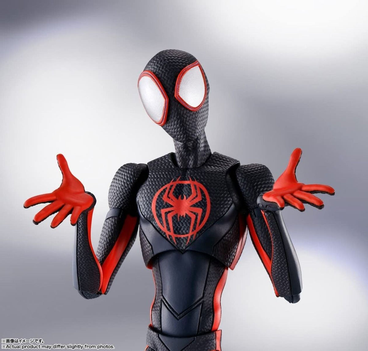 Spider-Man action figure with red and black suit on a gray background Spider-Man: Across The Spider-Verse 1/12 Scale Collectible Action Figures by CT Toys wondering 