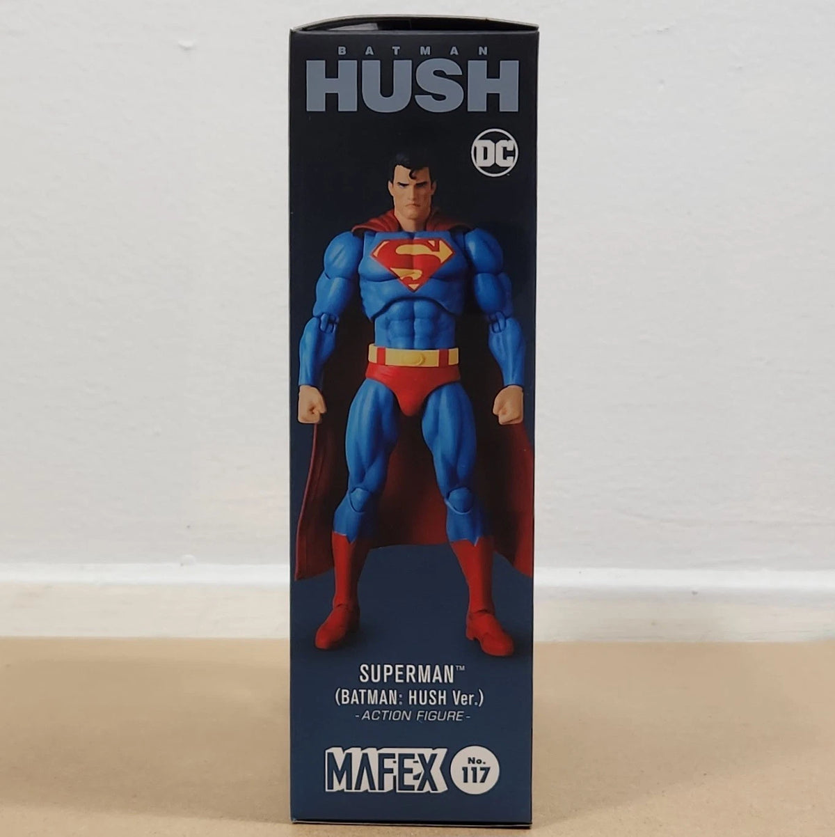 Superman action figure in packaging with 'Mafex' branding on a neutral background Superman: Hush Edition (No. 117) 1/12 Scale Collectible Action Figure by CT Toys