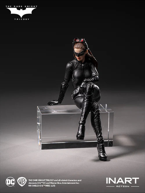 Catwoman figure from The Dark Knight Trilogy on a clear platform with INART branding.