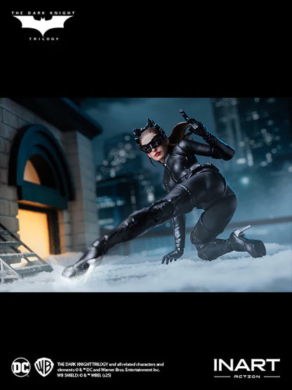 Catwoman figure from 'The Dark Knight Trilogy' by INART in a dynamic pose with a dark background.