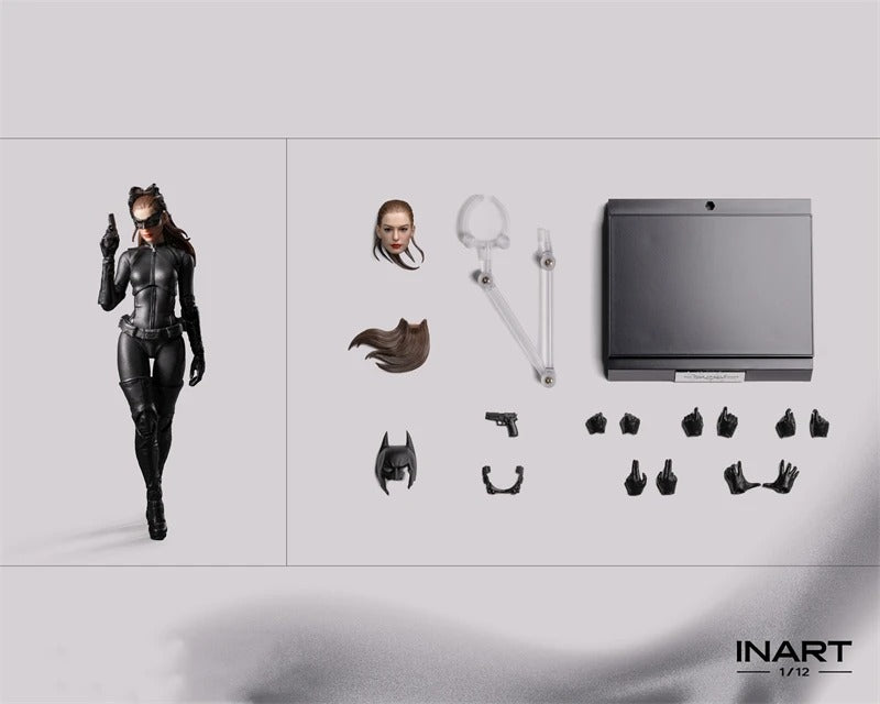 Action figure with accessories on a gray background, featuring the brand 'INART'. The Dark Knight Rises Catwoman 1/12 Scale Collectible Action Figure by INART 