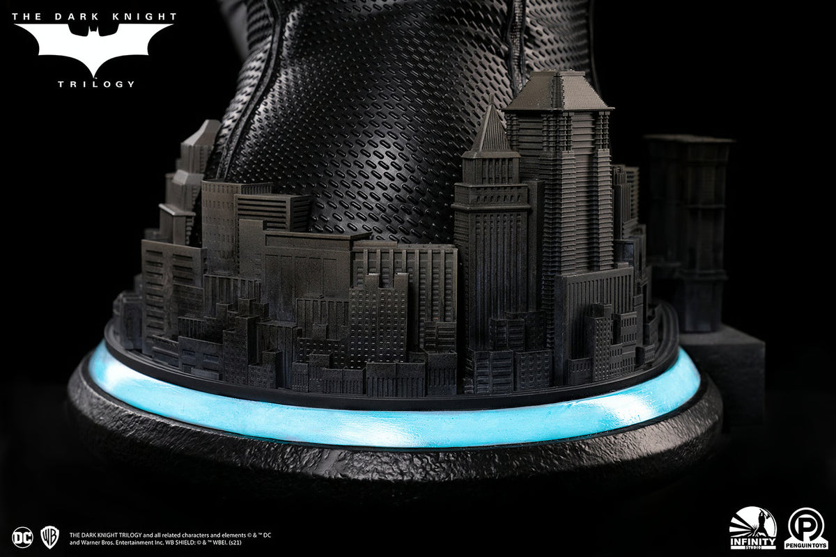 Model of a cityscape with a dark theme, featuring buildings and a prominent figure, on a black background. The Dark Knight Rises Catwoman (Selina Kyle) 1:1 Scale Life-Size Masterpiece Bust by Infinity Studio x Penguin Toys