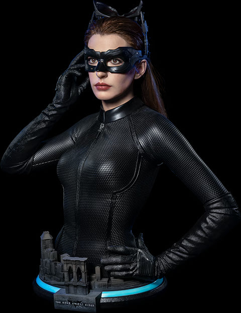 Statue of a character in a black superhero costume with a mask, standing on a dark background. The Dark Knight Rises Catwoman (Selina Kyle) 1:1 Scale Life-Size Masterpiece Bust by Infinity Studio x Penguin Toys