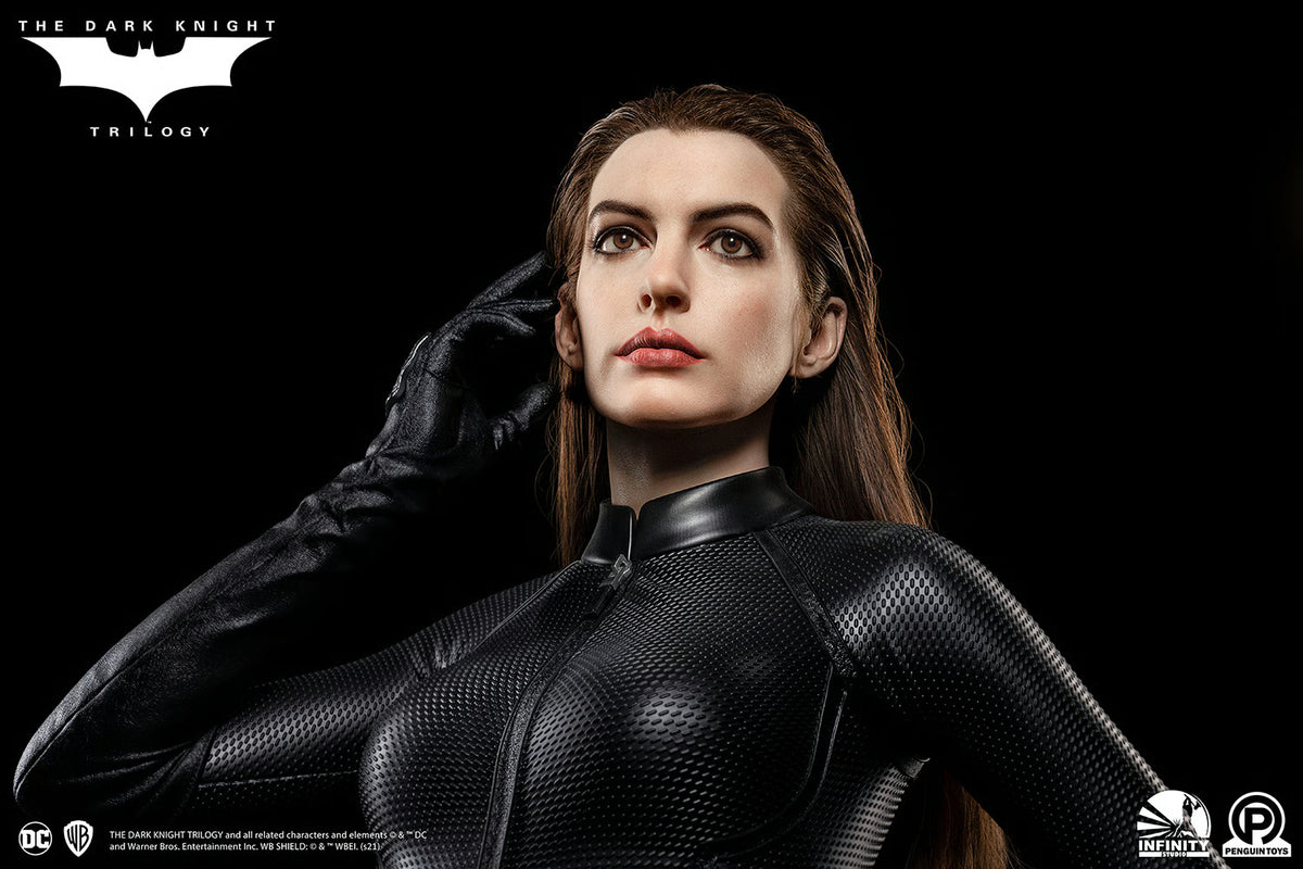 Character in black suit with 'The Dark Knight Trilogy' logo on a dark background The Dark Knight Rises Catwoman (Selina Kyle) 1:1 Scale Life-Size Masterpiece Bust by Infinity Studio x Penguin Toys