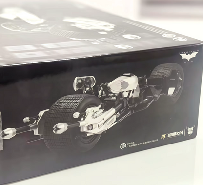 Black box with a detailed model of a vehicle on a white background The Dark Knight Trilogy Bat-Pod 1/12 Scale Precision Assembly Model Kit by Modoking