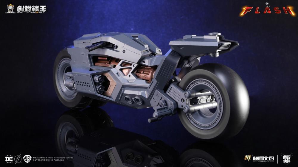 Toy motorcycle model on a reflective surface with a dark background The Flash (2023) Gotham Pursuit 1/12 Scale Precision Model Kit Set