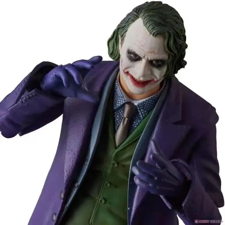 Action figure of The Joker from the movie 'The Dark Knight' on a white background The Joker: The Dark Knight Edition (No. 051) 1/12 Scale Collectible Action Figure