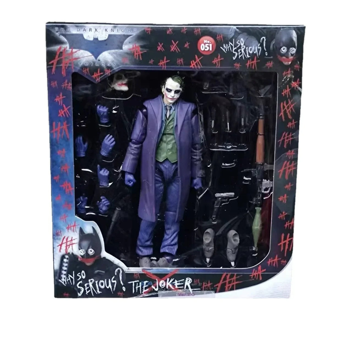 Action figure of The Joker from 'The Dark Knight' in packaging with text The Joker: The Dark Knight Edition (No. 051) 1/12 Scale Collectible Action Figure