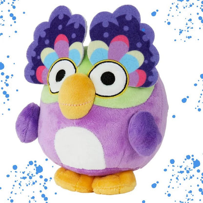 A purple plush bird toy with a yellow beak, white belly patch, yellow feet, and multicolored feather-like head details on a white background with blue paint splatter graphics. Official Bluey Chattermax Premium Cotton Plush by Titantoons