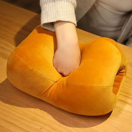 Yellow U-shaped pillow with a person's arm resting on it on a wooden surface One Piece: Monkey D. Luffy's Iconic Manga Meat 42cm Dual-Use Premium Plush Pillow